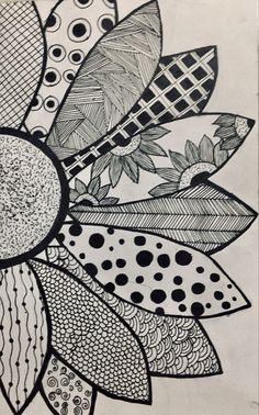 a black and white drawing of a sunflower with dots on it's petals