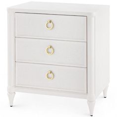 a white nightstand with three drawers and two gold pulls on the bottom one drawer is open