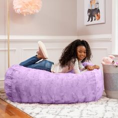 There's no better match for fluffy relaxation and fun playdates than the product. The soft yet supportive bean bag couch fits two kids, making it perfect for after-school video gaming. The product also lends well to quiet reading time, acting as a mini, body-hugging daybed when children layout on it. More than just cuddly, the product is convenient for parents; the incredibly soft faux fur cover is removable and machine-washable for easy cleaning so you can stay worry-free during arts and crafts Kids Bean Bag Chairs, Faux Fur Bean Bag, Fur Bean Bag, Bean Bag Lounger, Bean Bag Couch, Lounger Chair, Bean Bag Chairs, Buy Sofa, Bag Chairs