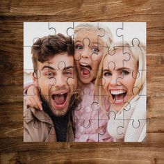 two people are posing for a puzzle photo