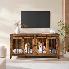 two dogs are sitting in their wooden cribs