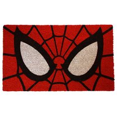 a door mat with a spiderman face on it