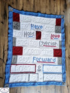 a blue and white quilt with words on it that read have love, laugh, be forward