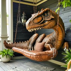 an inflatable dinosaur sitting on a porch swing