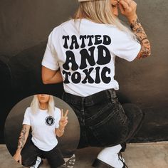 Get ready to rock your edgy style with our Tatted And Toxic t-shirt! Made from 100% cotton, this unisex shirt is perfect for any occasion. Its comfortable fit and unique design will make you stand out in a crowd. Show off your rebellious side with our Tatted And Toxic shirt. See the size chart below for measurements to ensure that you get the perfect fit Current processing time is 5-10 business days Cricut Graphic Tee Ideas, Vinyl T Shirt Designs, Bar Hopping Outfit Night Plus Size, Funny T-shirts For Women, Cricut Projects Clothes, Edgy Tshirt Designs, Cute Shirts To Make With Cricut, Tattoo Appointment Outfit, Diy Shirts Ideas