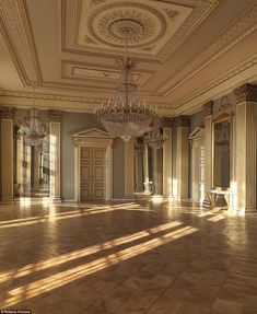 an empty ballroom with chandeliers and mirrors on the walls, in front of two doorways