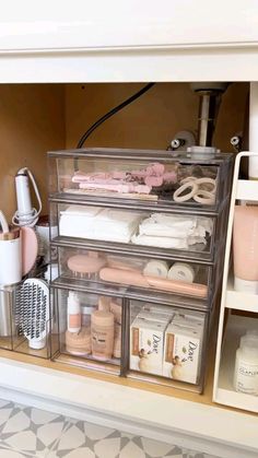 the drawers are organized with beauty products and personal care items