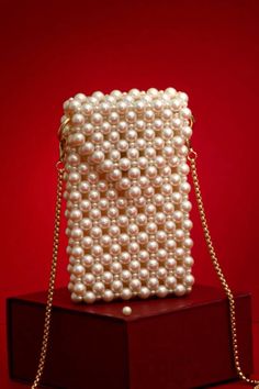 Pearl Mobile Sling ✨  Handmade with love 🫶🏻  Remember you can always personalise with the color, design and type of stone you want.  Price : 799 free shipping 🛍️ Pearl Phone Case, Pearl Purse, Mobile Bag, Mobile Pouch, Mobile Cover, Kids Bracelets