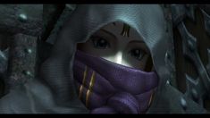 a woman wearing a purple scarf and hood