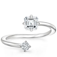 an engagement ring with a diamond on the side