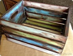 an old wooden box is sitting on the counter