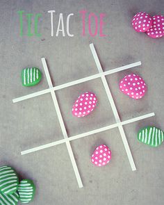 a tic - tac toe game with polka dots and green eggs on it