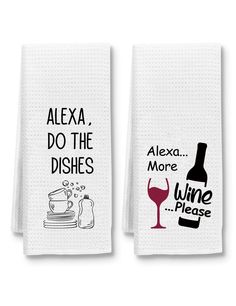 two white towels with black and white words on them, one has a wine glass and the other has a bottle