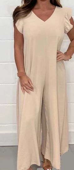 Buy 2 get 10% off Buy 3 get 15% off Buy 4 get 20% off Balancing style and comfort, this V-neck solid color fly sleeve jumpsuit lets you radiate charm anytime, anywhere – a must-have fashion staple in your wardrobe!✨ Size Chart（S-5XL）NOTE：Please allow slight measurement deviations due to manual measurement 1-3cm.Due to the different monitor and light effect, the actual color of the item might be slightly different from the color showed in the pictures. FEATURES Ultimate Comfort: This V-neck, solid color fly sleeve jumpsuit is the epitome of comfortable fashion. Crafted with a relaxed fit in mind, it features an elastic waistband that ensures softness and comfort all day long. The wide-legged design drapes beautifully for a perfect fit, making this jumpsuit an ideal choice for vacation, beac Beach Lounge, Colorful Jumpsuit, Green Jumpsuit, Red Jumpsuit, Fabric Light, Style Looks, Casual Jumpsuit, Leg Design, Jumpsuit With Sleeves