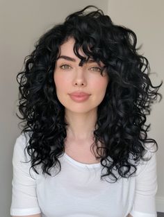 Curly Hair Widows Peak Women, Cool Tone Curly Hair, Dyed Black Curly Hair, Curl Haircuts For Women, Jet Black Hair Curly, Curly Jet Black Hair, Black Curly Hair With Bangs, Curly Black Hair Girl, Haïr Cut Wavy Hair