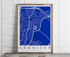 a blue poster with the words, goodison on it in front of a white brick wall