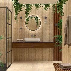 a bathroom with a sink, mirror and plants on the wall