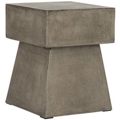 the concrete side table is made from cement blocks