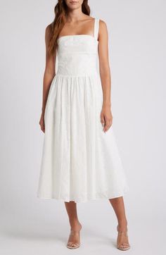 Eyelet and ribbon lacing adds an edgy touch to a vintage-inspired sundress boasting a bustier-style bodice and flared midi skirt. Exclusive retailer Square neck Side patch pockets Lined 77% viscose, 21% polyester, 2% elastane Dry clean Imported Flared Midi Skirt, Halter Sundress, White Sundress, Midi Sundress, Midi Flare Skirt, Floral Sundress, Lace Corset, House Of Cb, House Dress