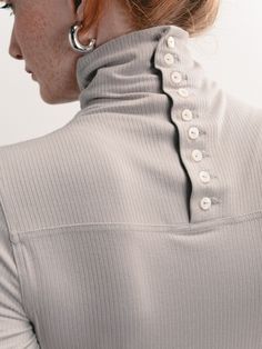 A turtleneck is a staple piece for a classic look, worn by itself or under any sweater or jacket. This one has interesting details such as a fine ribbed fabric and buttons up the back of the neck—yes, wear your hair up to show them! And remember, the little details of your life matter. Designer Turtleneck, Architectural Fashion, Outfit Ideas Winter, Winter Outfits Aesthetic, Simple Fall Outfits, Winter Dress Outfits, Winter Outfit Inspiration, Winter Dress, Room Size