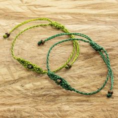 Carmina Giron in Guatemala employs macrame techniques, known as the "art of knots", to create this pretty pair of bracelets. The two bracelets are accented with metallic glass beads. Cheap Green Bracelet With Sliding Knot, Beaded Macrame Bracelets, Macrame Techniques, Hemp Macrame, Green Macrame, Beaded Macrame, Buy Bead, Macrame Bracelets, Delicate Bracelet