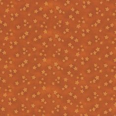 an orange background with gold stars on it