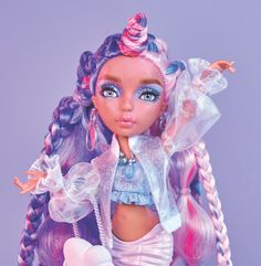 a barbie doll with pink hair and blue eyes