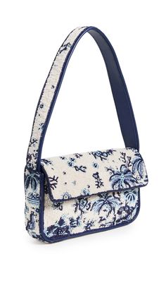 PRICES MAY VARY. Fabric: Glass beads Leather piping, Satin lining , Fold over flap with magnetic closure, Slip back pocket, zip interior pocket, Toile pattern Length: 10.25in / 26cm, Height: 6in / 15cm, Handle drop: 9in / 23cm, Depth: 1.5in / 4cm Lined Weight: 18oz / 0.51kg Meet Tommy! This statement-making STAUD shoulder bag stands out in a crowd with beaded tropical patterning, and is roomy enough for almost everything your workday (or weekend) requires. Tommy Beaded Bag, Fabric Glass, Statement Sandals, Toile Pattern, Purse Brands, Beaded Bag, Bag Stand, Fancy Bags, Pretty Bags