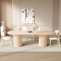 a dining table with four chairs and a vase on the table in front of it