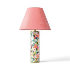 a pink lamp with flowers on it and a light in the shape of a vase