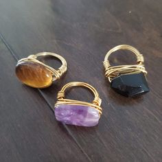 All Are Size 5.5 And Are Real Gemstones Wrapped On Gold Coated Wire. I Made These! Super Fun Jewelry To Wear! Featuring Tiger's Eye, Amethyst And Jet. You Get All 3 To Mix And Match! Wire Rings Ideas, Handmade Rings Wire, Fun Jewelry, 5 Rings, Wire Rings, Wire Wrapped Rings, Handmade Rings, Tiger's Eye, Beaded Rings