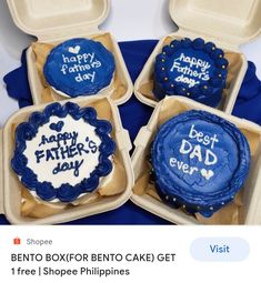 four blue decorated birthday cakes in boxes with happy father's day written on them