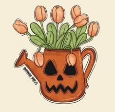 an orange watering can filled with flowers and jack - o'- lantern stickers