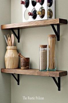 two wooden shelves with wine bottles and spices on them