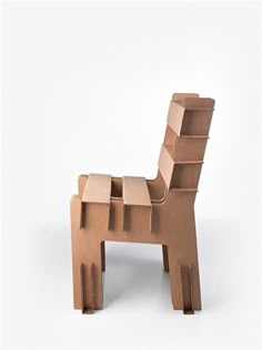 an animal made out of cardboard sitting on top of a table