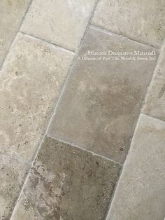 the floor is made up of several different types of stone and has been cleaned with no mortar