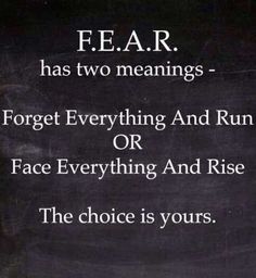 a sign that says fear has two meaningss forget everything and run or face everything and rise the choice is yours