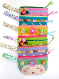 a stack of multicolored hair ties on top of each other with different designs