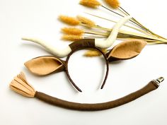 an assortment of hair accessories on a white surface