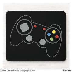 a video game controller mouse pad on a white surface with the text, game controller by tygraphic trees