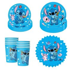 a set of plates, cups and napkins with cartoon characters on them in blue