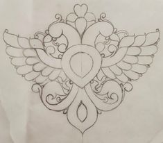 a drawing of an ornate design with hearts and wings on it's back side