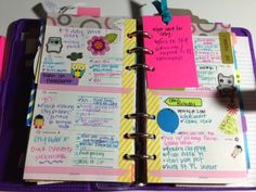 an open planner book sitting on top of a purple case filled with notes and stickers