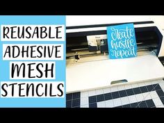 the words reusable adhesive mesh stencils are displayed on a machine