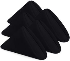 three black placemats sitting on top of each other