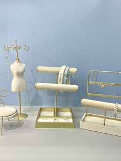 there are three mannequins on display in this room with jewelry and other items