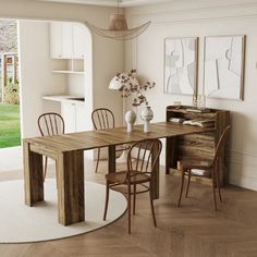 a dining room table and chairs in front of a sliding glass door