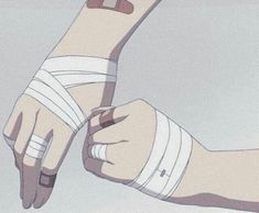 two people holding hands with bandages on them