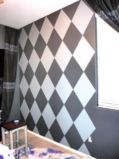 a room that has a checkered wall in it