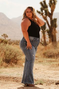 Details High rise 32" inseam Distressed knee Comfy and stretchy Care 88% Cotton 10% Rayon 2% Spandex Model's Measurements Height: 5'4", Inseam: 29.5", Hips: 55", Waist: 45", Bust: 48" Model wearing a size 16 Photoshoot Plus Size Photography Poses, Western Style Plus Size, Poses For Curvy Women, Plus Size Cowgirl, Plus Size Western Wear, Female Plus Size, Plus Size Posing, Size 20 Women, Modeling Poses